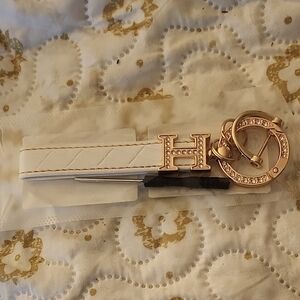 Elegant White Keychain with Gold Accents